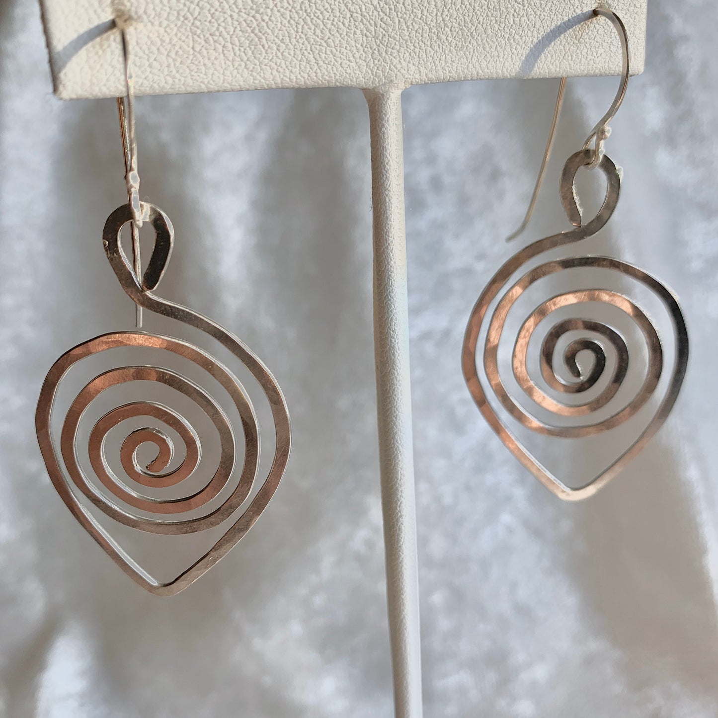 Spiral leaf-shaped earrings - spiral design leaf in silver wire with sterling silver ear wires.