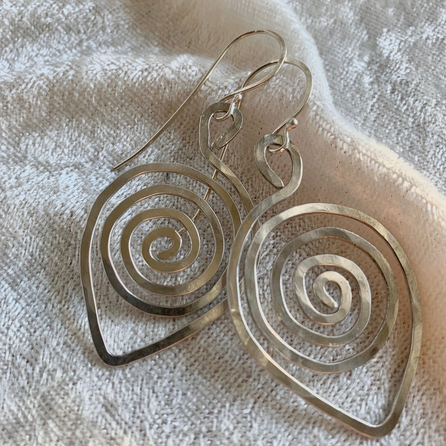 Spiral leaf-shaped earrings - spiral design leaf in silver wire with sterling silver ear wires.