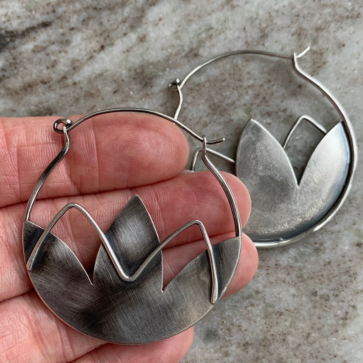 Big silver hoops with lotus flower, statement jewelry in sterling with nature theme design, handmade silver hoop earrings
